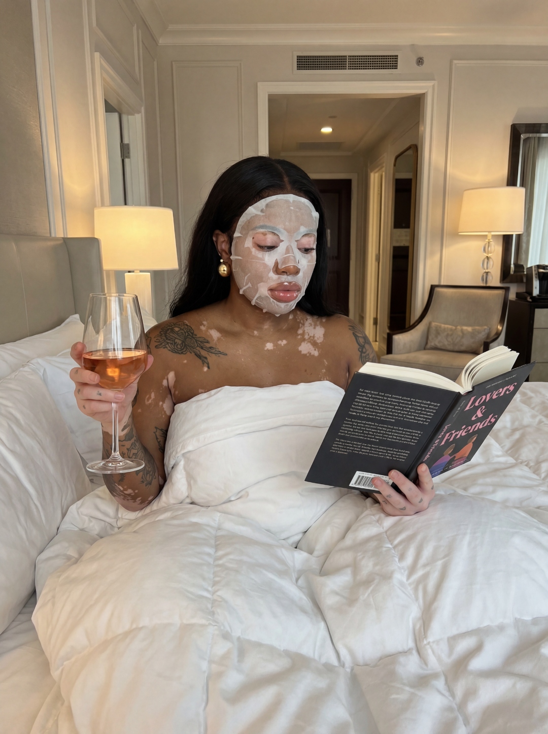 Self-care ritual — face mask, book, rosé